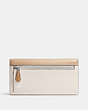 COACH®,SLIM TRIFOLD WALLET IN COLORBLOCK,Refined Pebble Leather,Silver/Sandy Beige Multi,Back View