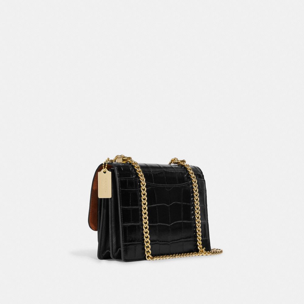 COACH®,KLARE CROSSBODY BAG,Novelty Leather,Medium,Gold/Black,Angle View