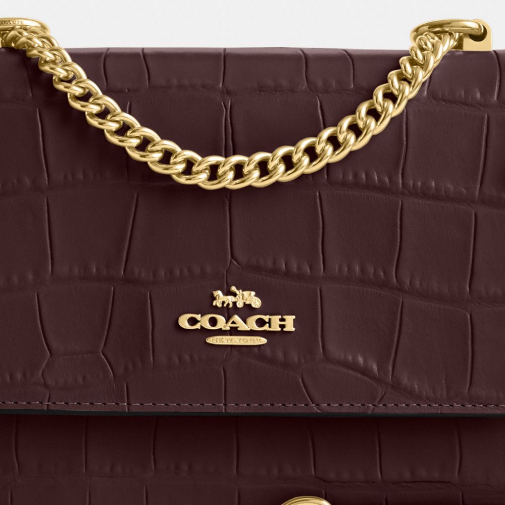 COACH®,SACS À PORTÉ-CROISÉ KLARE,Cuir innovant,Or/Merlot