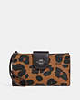 COACH®,PHONE WALLET WITH LEOPARD PRINT AND SIGNATURE CANVAS INTERIOR,Leather,Silver/Light Saddle Multi,Front View