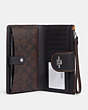 COACH®,PHONE WALLET WITH LEOPARD PRINT AND SIGNATURE CANVAS INTERIOR,Leather,Silver/Light Saddle Multi,Inside View,Top View