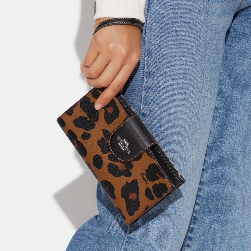 COACH®,PHONE WALLET WITH LEOPARD PRINT AND SIGNATURE CANVAS INTERIOR,Signature Canvas,Silver/Light Saddle Multi,Detail View