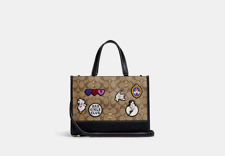 COACH®,DISNEY X COACH DEMPSEY CARRYALL IN SIGNATURE CANVAS WITH PATCHES,Signature Coated Canvas,Medium,Gold/Khaki Multi,Front View