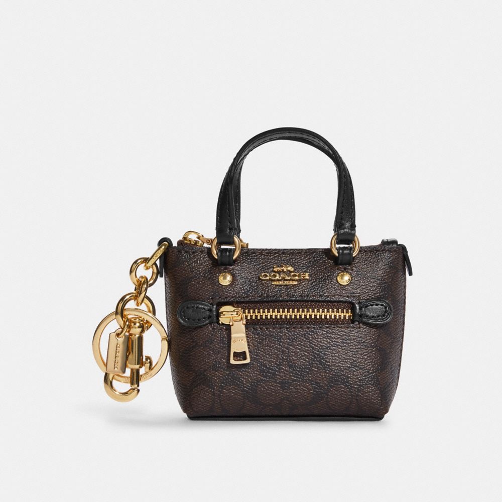 COACH®,MINI GALLERY TOTE BAG CHARM IN SIGNATURE CANVAS,Mini,Gold/Brown Black,Front View