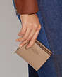 COACH®,SNAP WALLET,Refined Pebble Leather,Mini,Gold/Taupe,Detail View