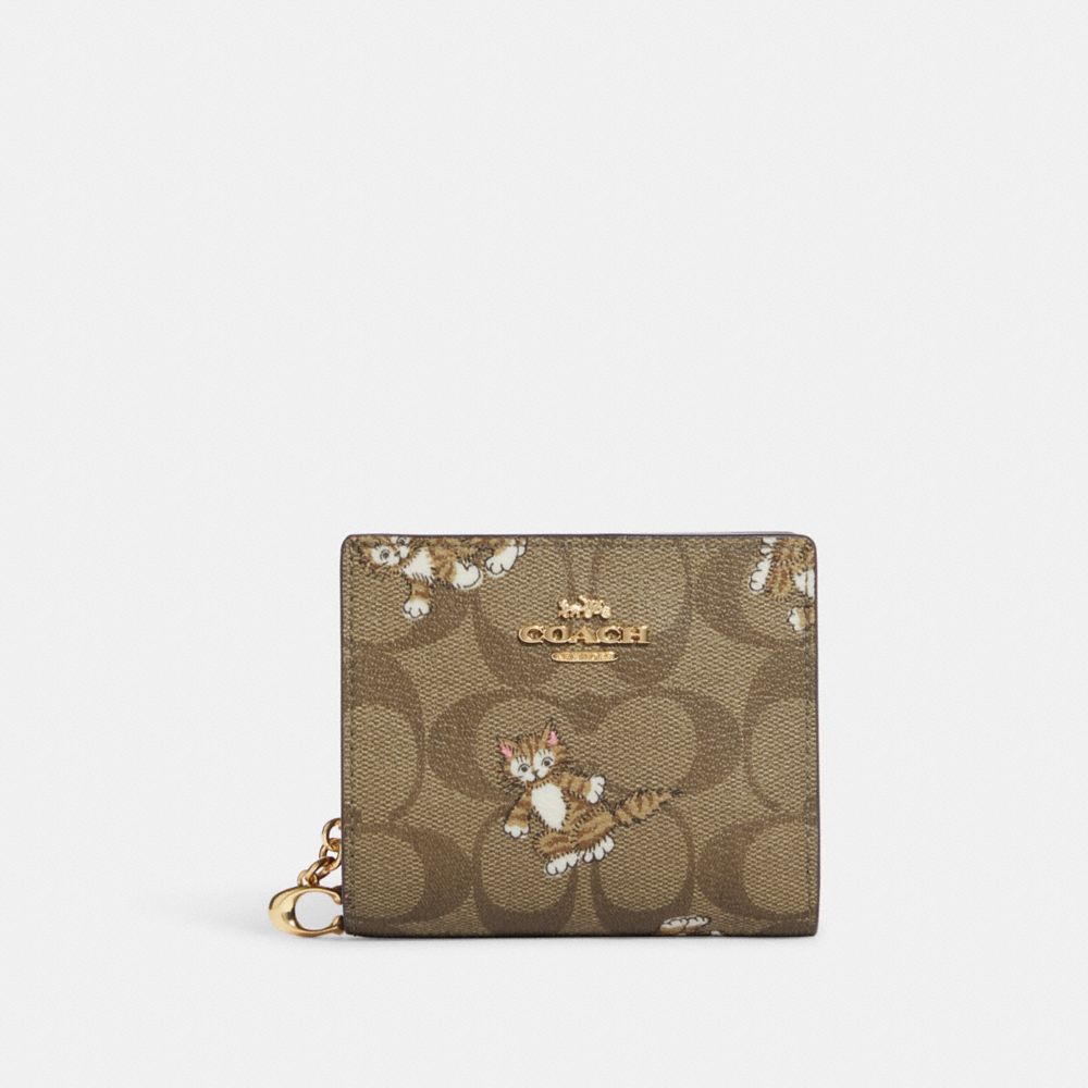 Coach snap card case in signature canvas hot sale