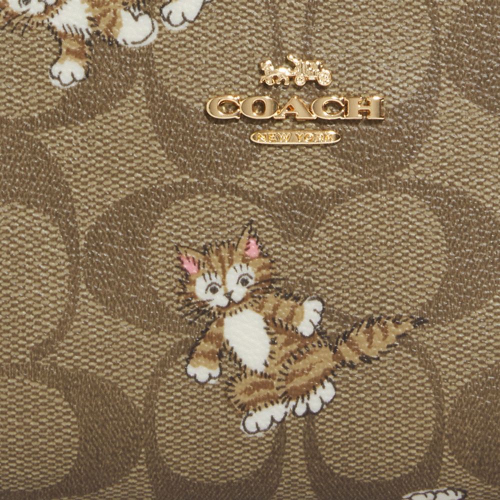 Coach cat wallet hot sale