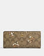 COACH®,SLIM WALLET IN SIGNATURE CANVAS WITH DANCING KITTEN PRINT,Gold/Khaki Multi,Front View