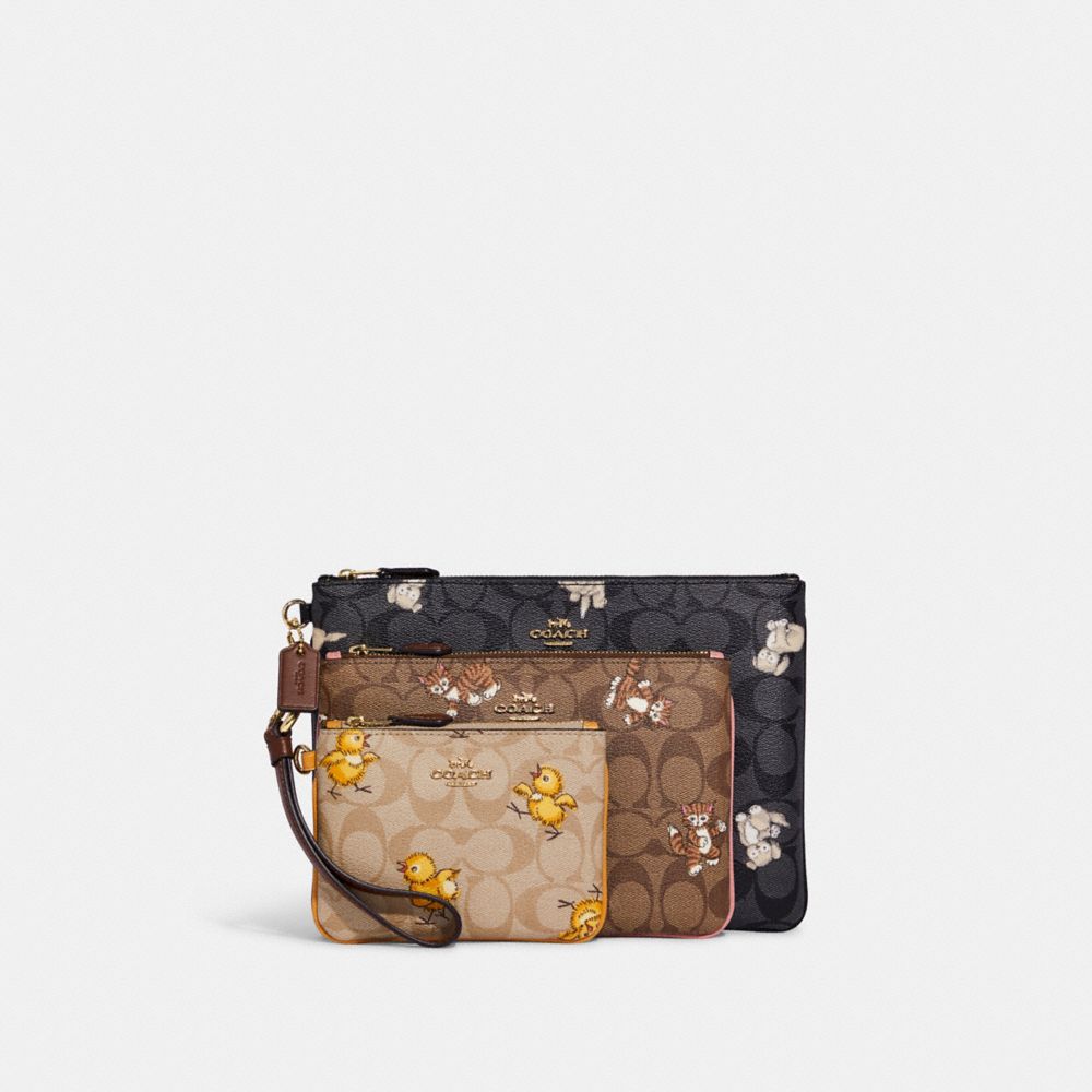 COACH Outlet Pouch Trio In Signature Canvas With Creature Print