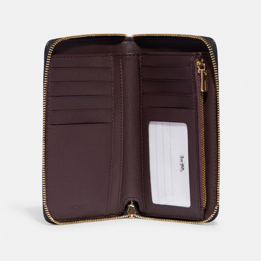 COACH® | Medium Id Zip Wallet In Signature Leather