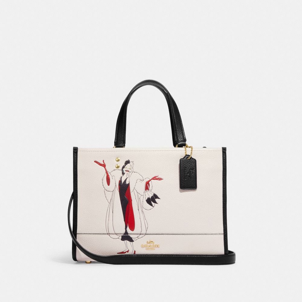 COACH®  Disney X Coach Dempsey Carryall With Cruella Motif