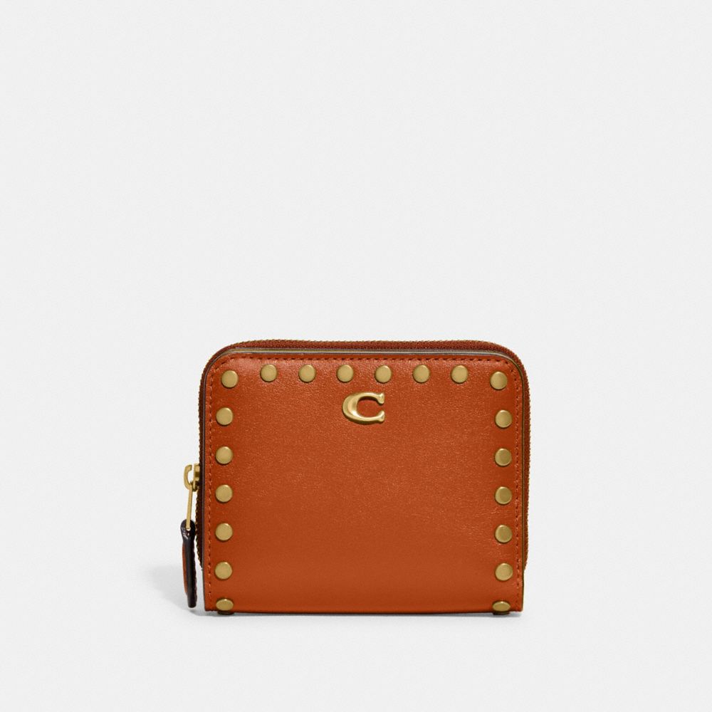 COACH®,BILLFOLD WALLET WITH RIVETS,Glovetanned Leather,Brass/Canyon,Front View image number 0