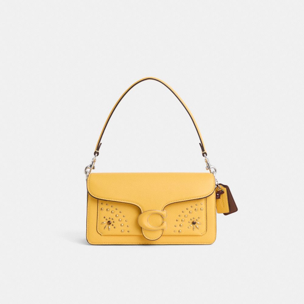 COACH x PEANUTS 国内買付 ニュースペーパー print Tabby Bag 26 公式】COACH – コーチ | 【COACH X PEANUTS】タビー ショルダー