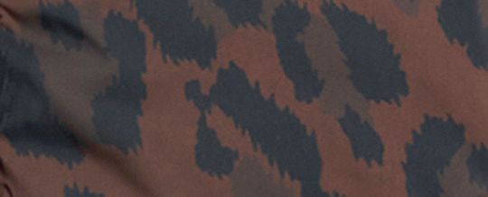 COACH®,Leopard Print Reversible Puffer Jacket In Recycled Polyamide,