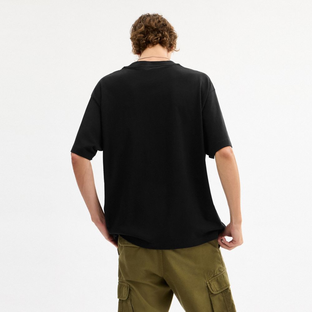 COACH®,Pumpkin Relaxed T Shirt In Organic Cotton,Black,Scale View