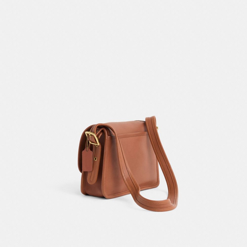 COACH®,Vintage Rambler's Legacy Bag,Calfskin Leather,Crossbody,Embossed,Logo,Sustainable,Casual,Brown,Angle View