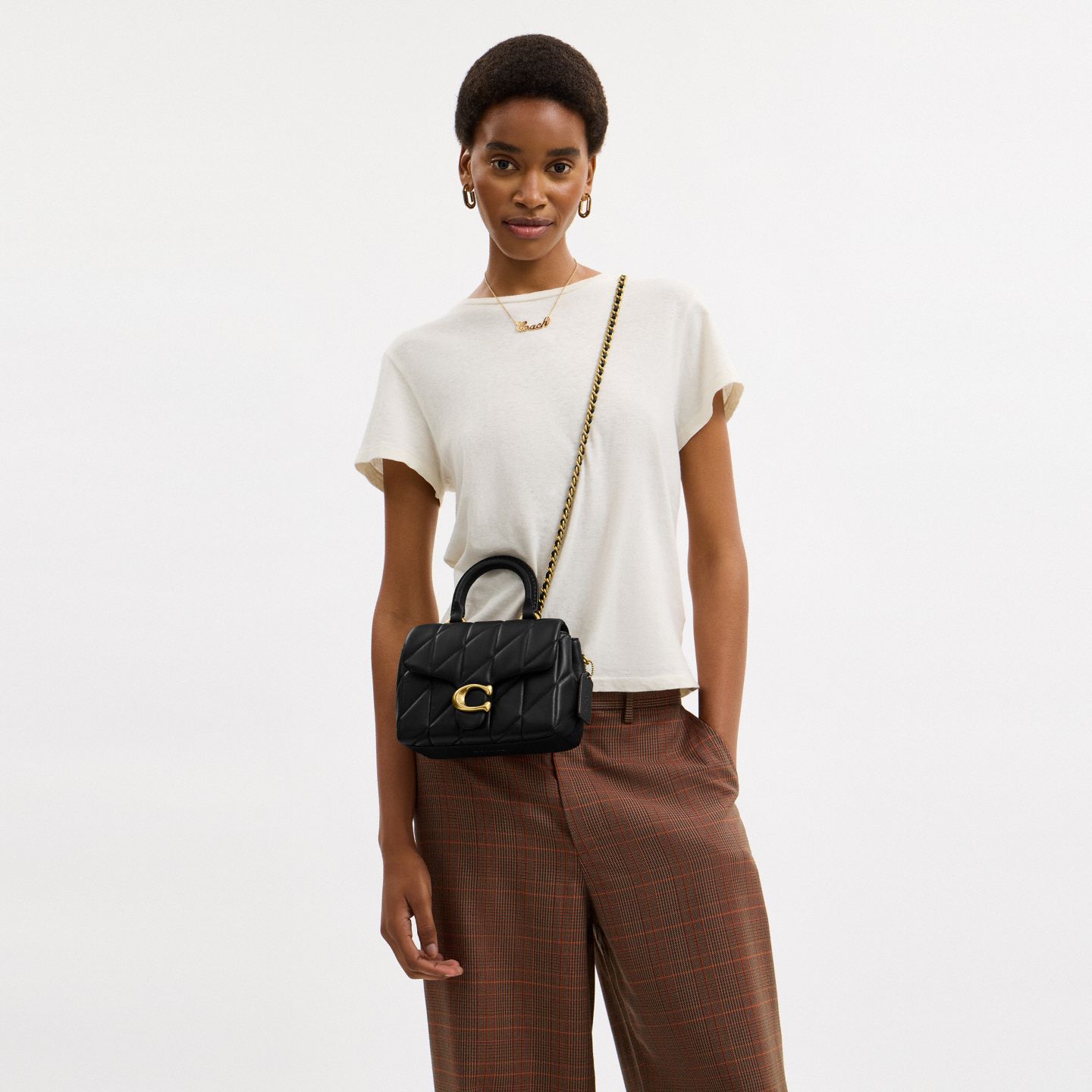 Женская сумка Coach Tabby Top Handle Bag With Quilting, цвет: Латунный / Чёрный — фото 7