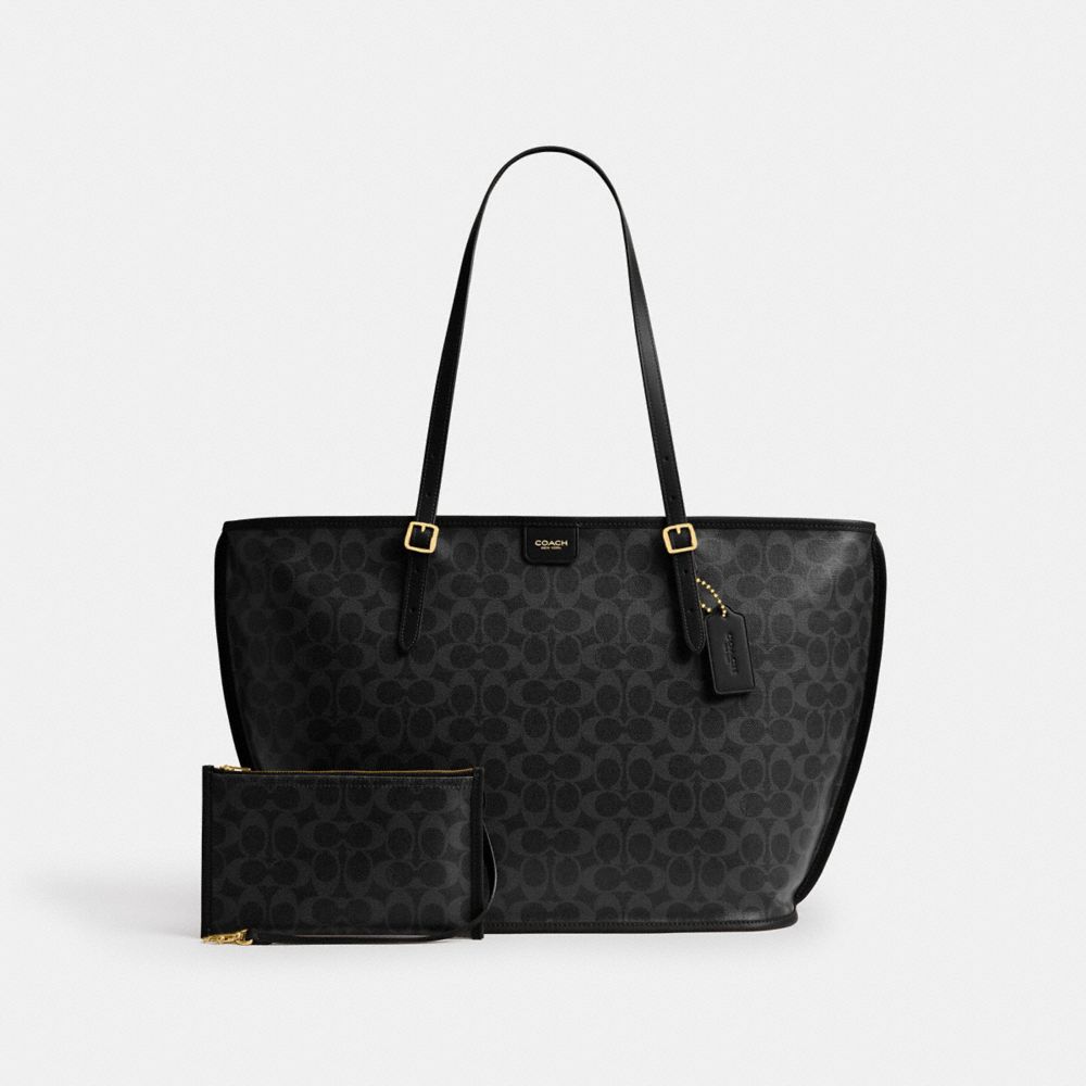 COACH®,Taxi Tote Bag In Signature Canvas,,Angle View