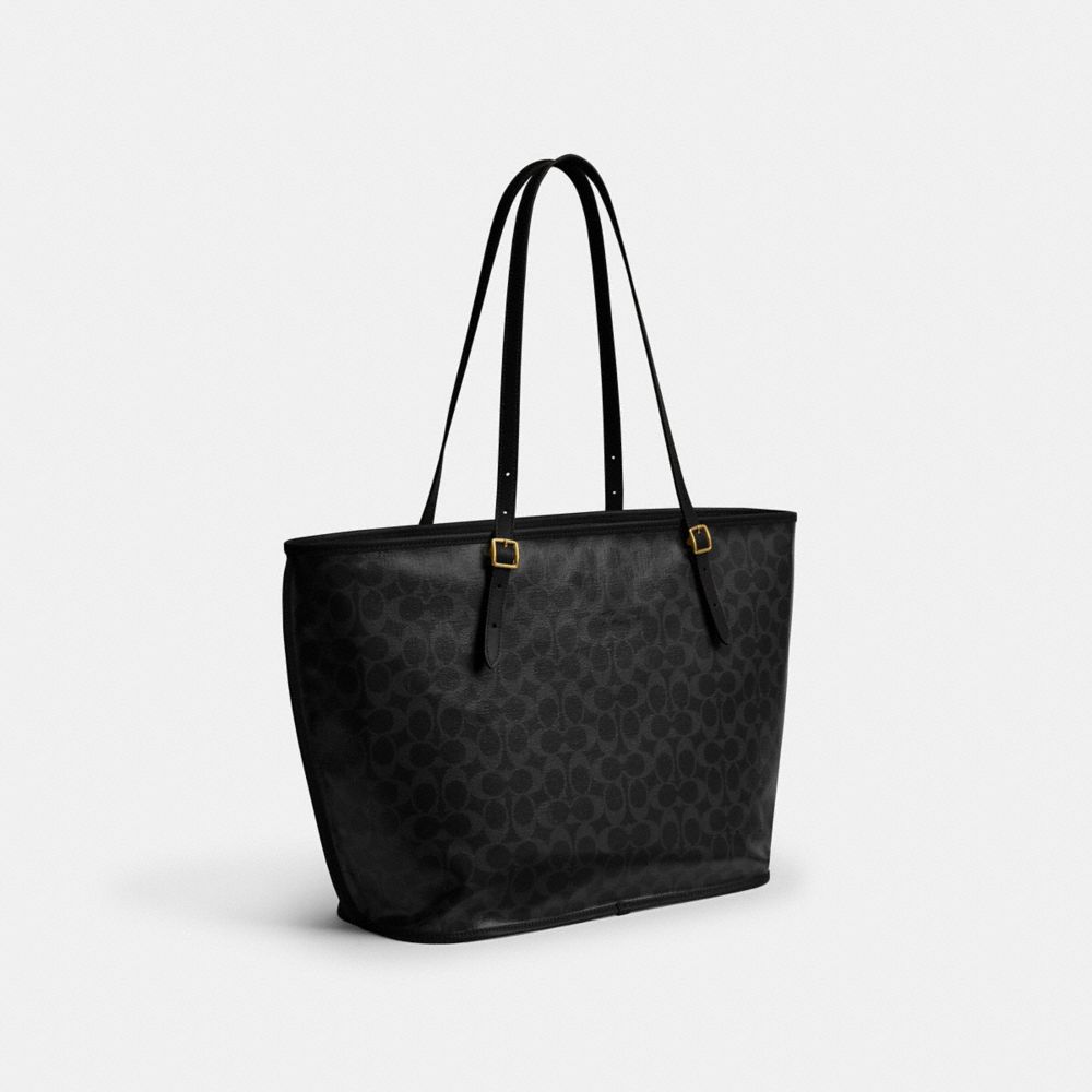 COACH®,Taxi Tote Bag In Signature Canvas,,Angle View