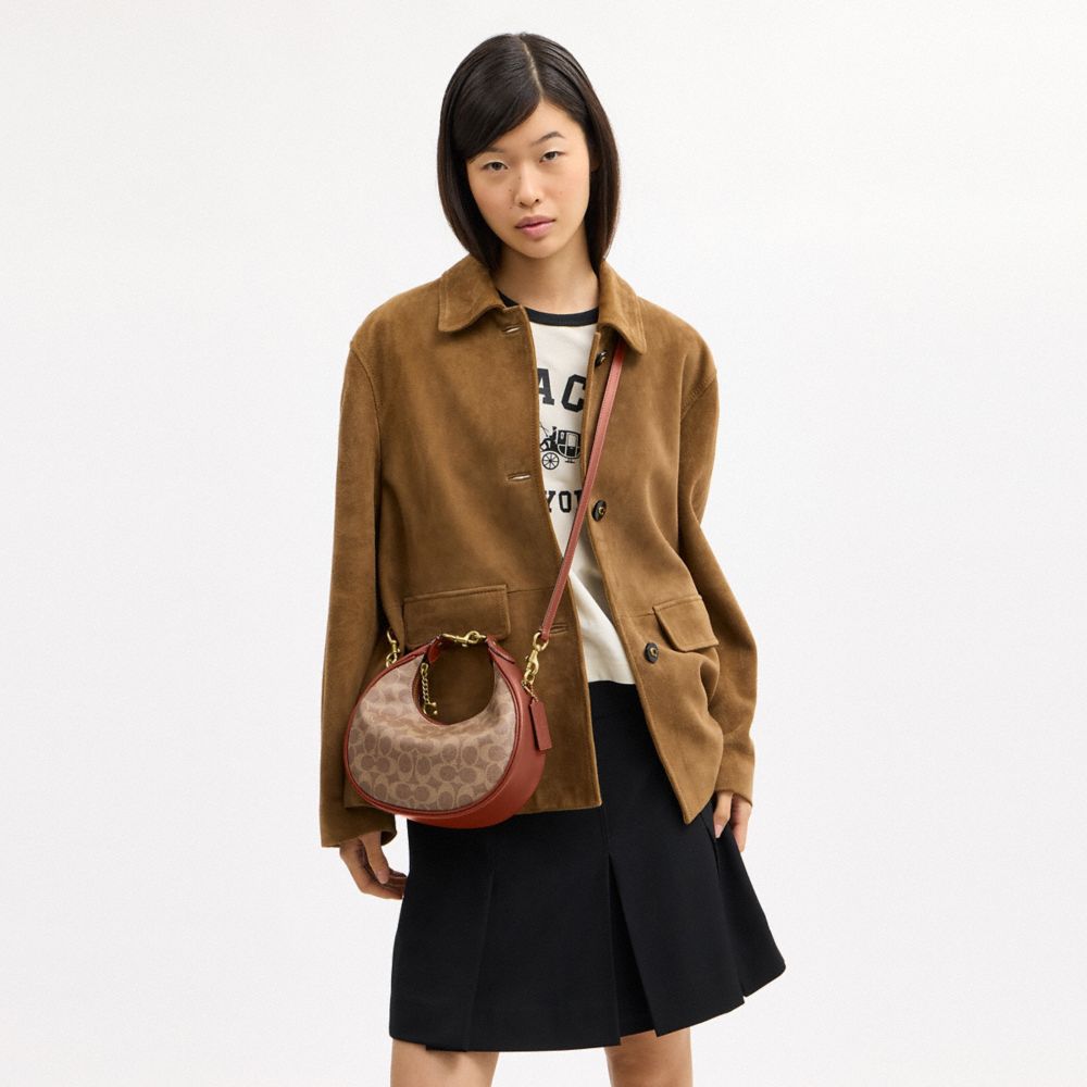 COACH®,Jonie Bag 22 In Signature Canvas,