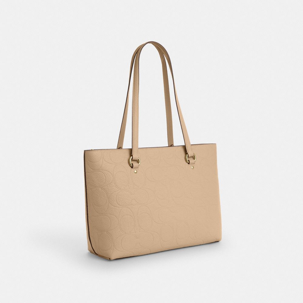 COACH®,Station Tote Bag In Signature Leather,,Angle View