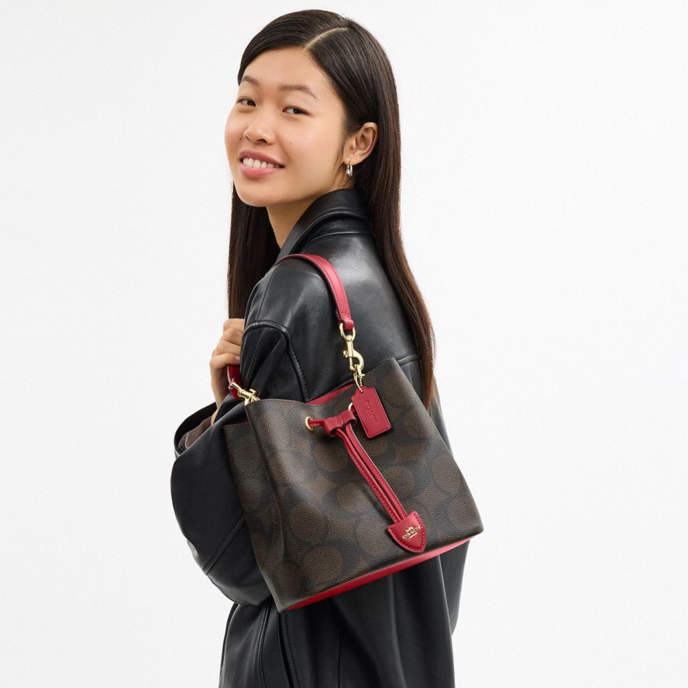 COACH®,Rowan Bucket Bag In Maxi Signature Canvas,Brown,Detail View