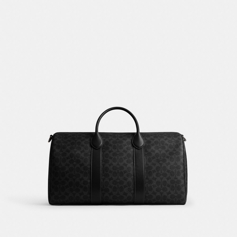 COACH®,Compass Bag 50 In Signature Canvas,Black,Back View