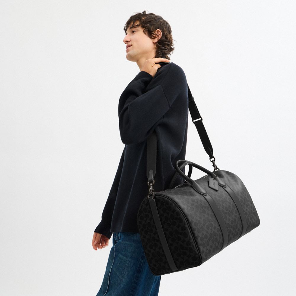 COACH®,Compass Bag 50 In Signature Canvas,Canvas,Leather,Weekender,Gold Metal,Black,Detail View