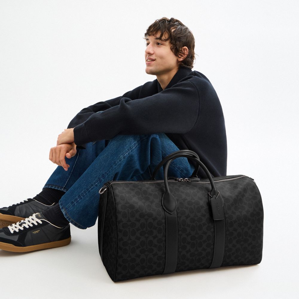 COACH®,Compass Bag 50 In Signature Canvas,Canvas,Leather,Weekender,Gold Metal,Black,Detail View