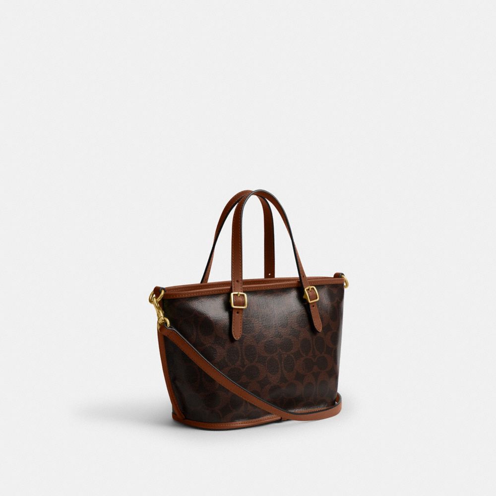 COACH®,Taxi Tote Bag 21 In Signature Canvas,,Angle View