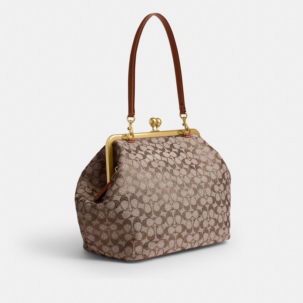 COACH®,Large Kisslock Frame Bag In Crystal Signature Jacquard,Recycled Polyester,Cotton,Leather,Shoulder Bag,Crystal,Rhine...,Multi Color,Angle View