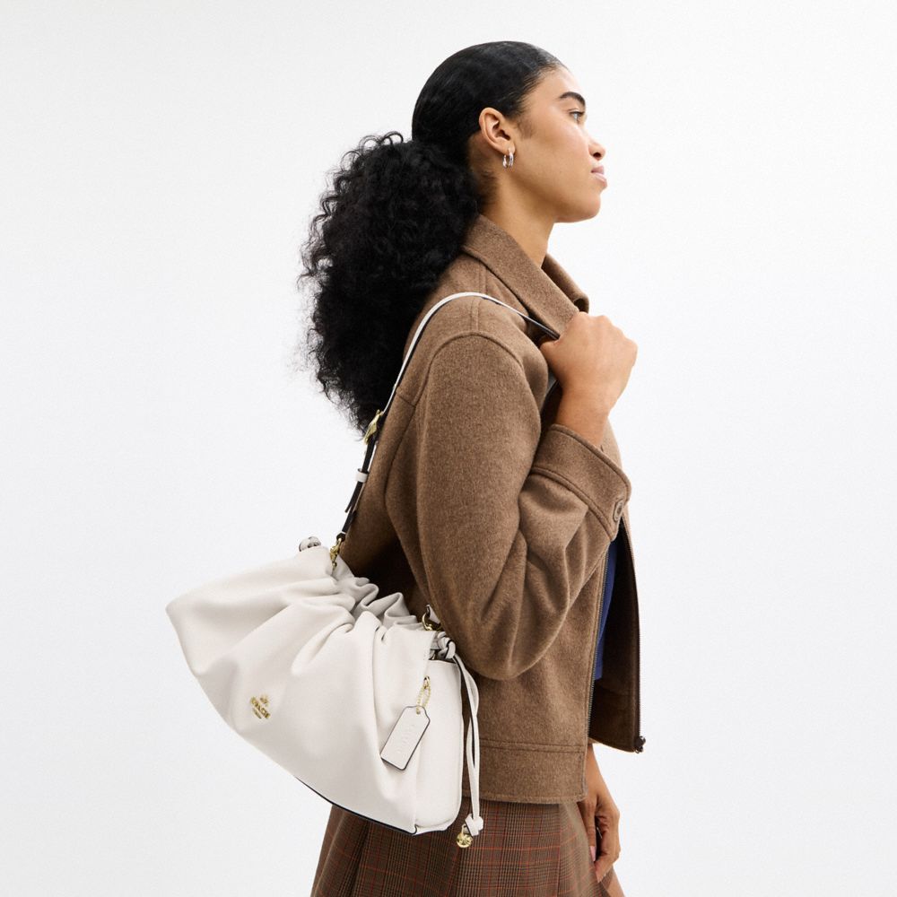 COACH®,Faye Large Shoulder Bag,Leather,Bucket,Ruched,Logo,Metal,Lined,Shoulder Guard,Silver Metal,Day Party,White,Detail View