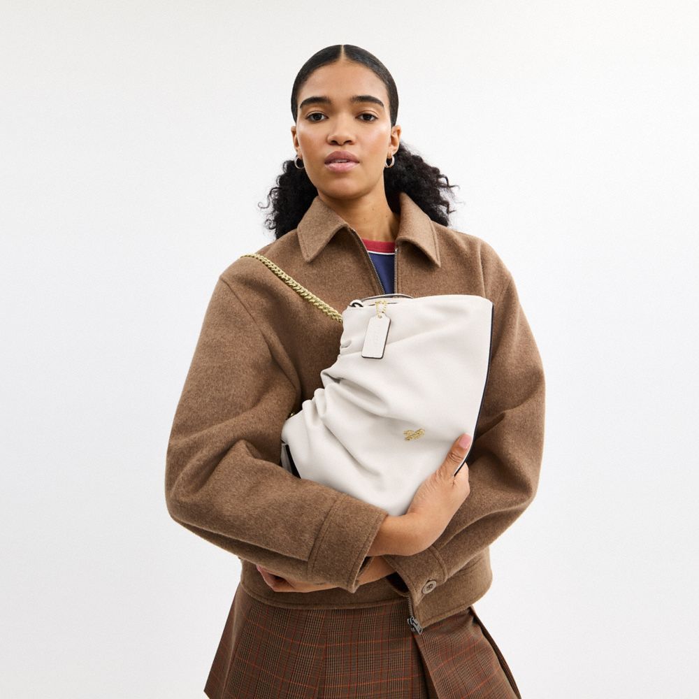 COACH®,Faye Large Shoulder Bag,Leather,Bucket,Ruched,Logo,Metal,Lined,Shoulder Guard,Silver Metal,Day Party,White,Detail View