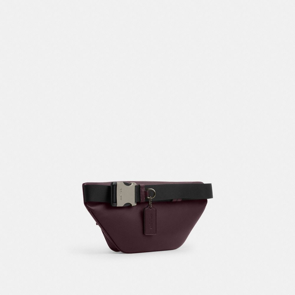 COACH®,Racer Small Belt Bag In Signature Canvas,Maroon,Angle View