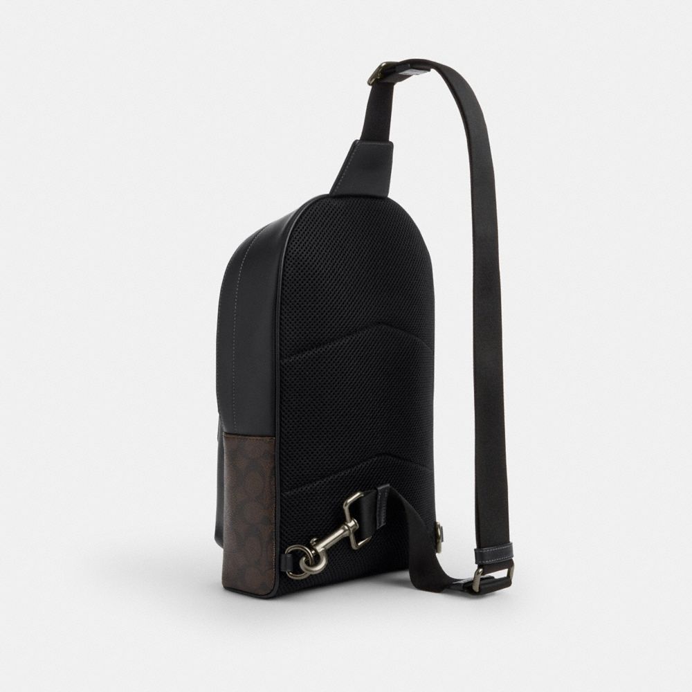 COACH®,West Pack In Signature Canvas With Varsity Graphic,Black,Angle View