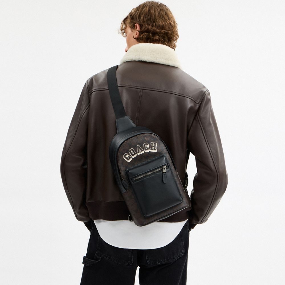 COACH®,West Pack In Signature Canvas With Varsity Graphic,Black,Detail View