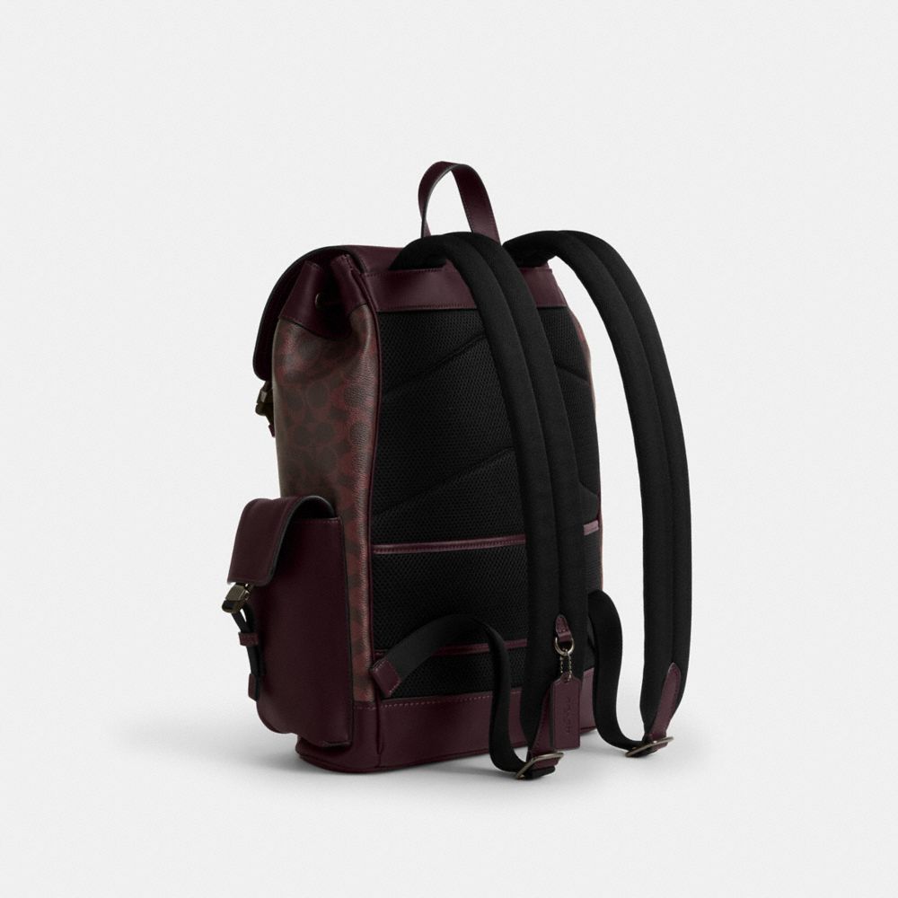 COACH®,Clark Backpack In Signature Canvas,Canvas,Fabric,Leather,Calfskin Leather,Backpack,Logo,Adjustable,Suitcase Sleeve,...,Maroon,Angle View