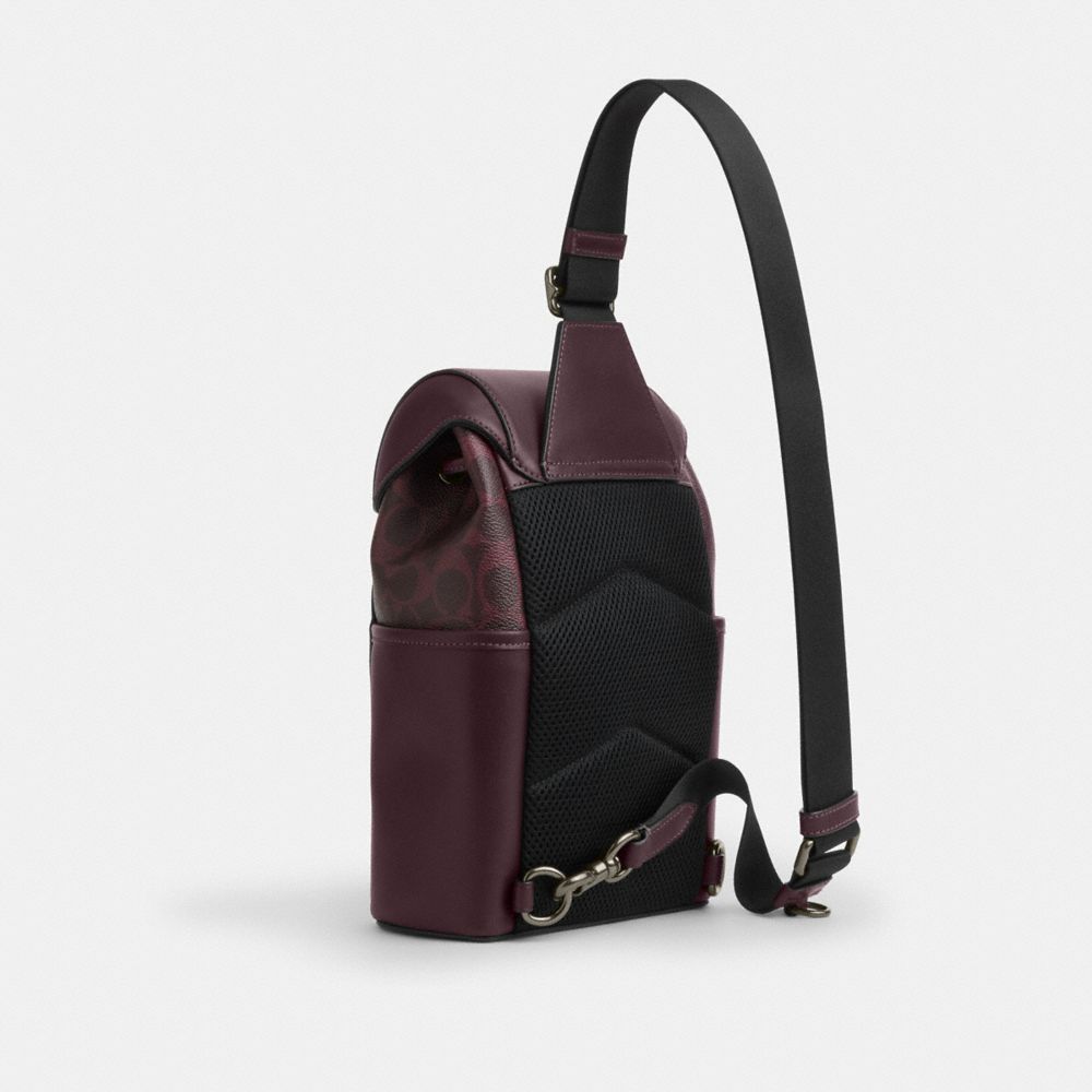 COACH®,Racer Pack In Signature Canvas,Maroon,Angle View