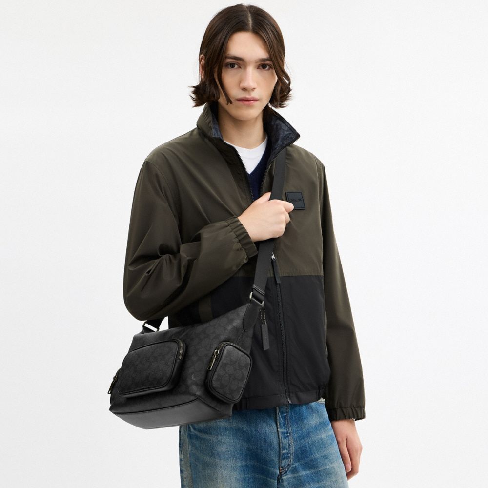 COACH®,Finn Crossbody Bag With Pockets In Signature Canvas,Black,Detail View
