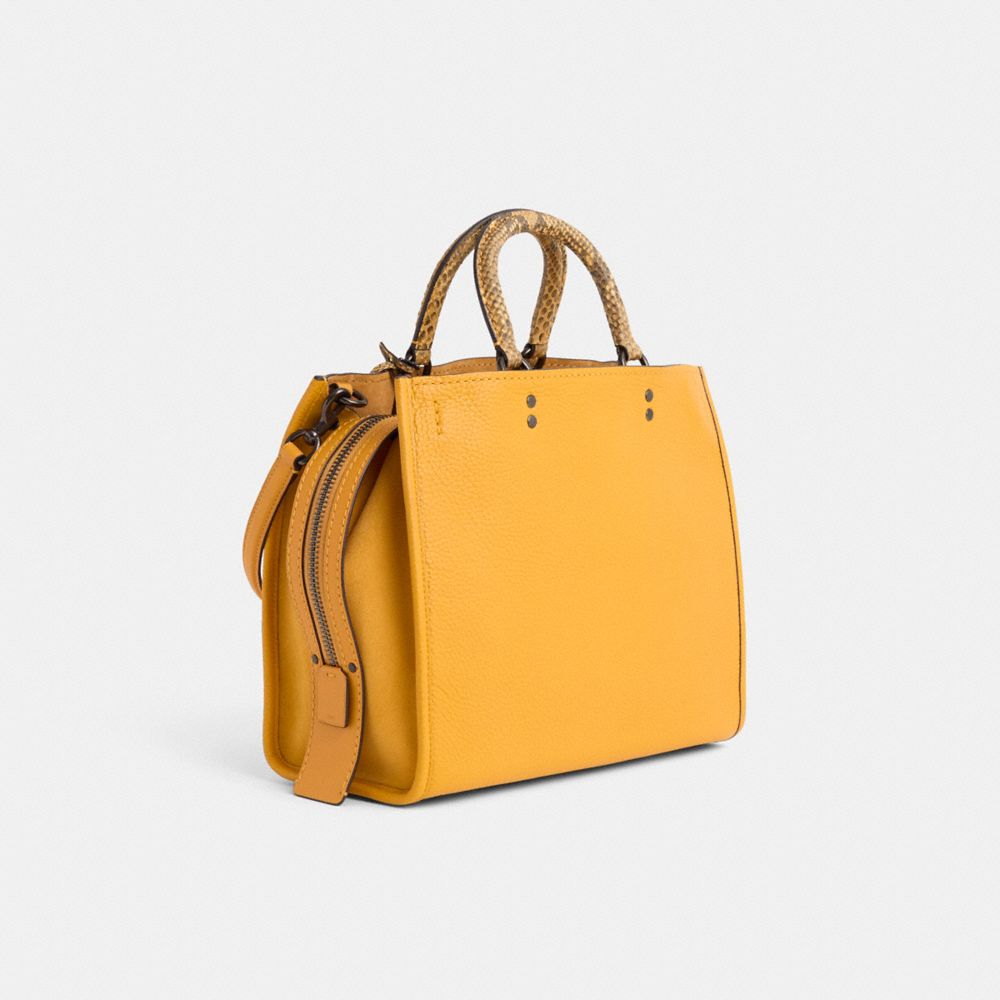 COACH®,Restored Rogue Bag With Snakeskin Detail,Yellow,Angle View