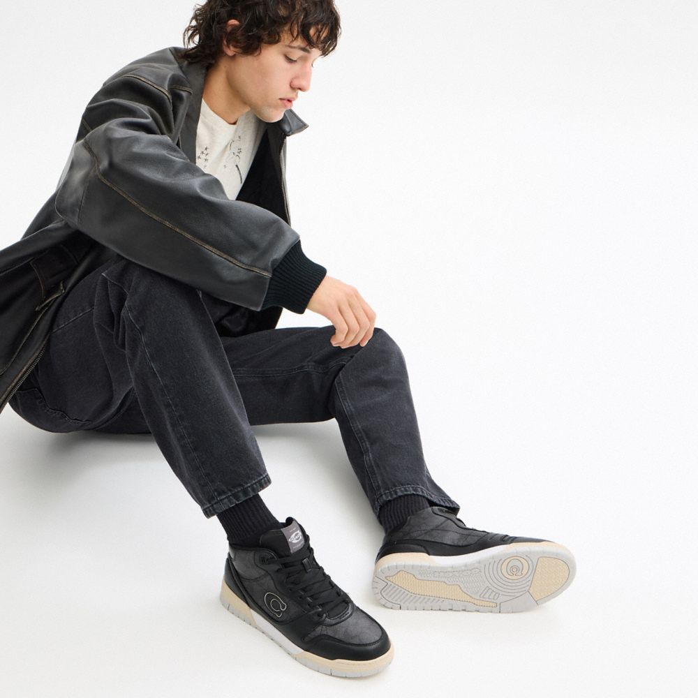 Coach Soho Mid Top Sneaker In Signature Canvas In Black