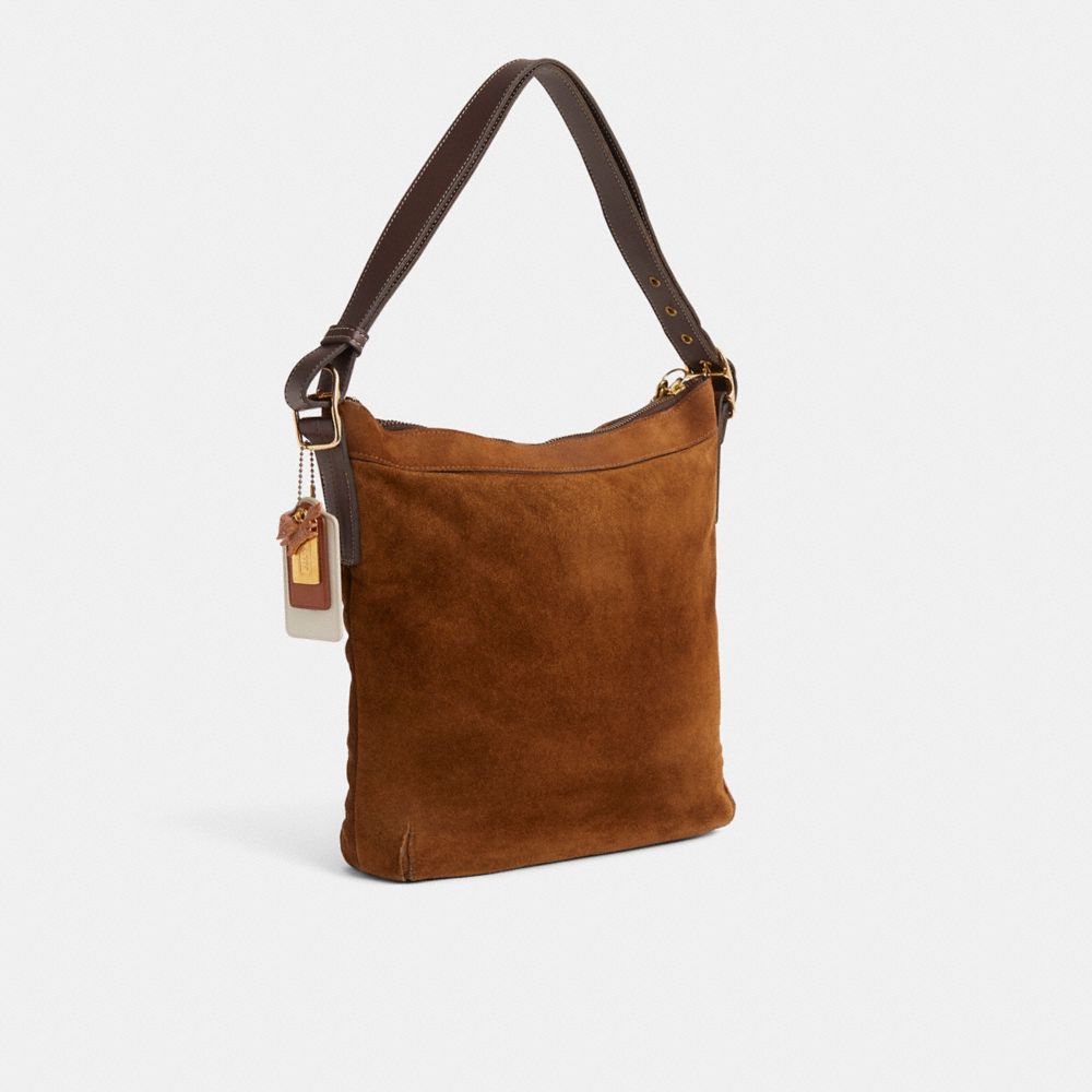COACH®,Upcrafted Vintage Medium Slim Duffle Sac,Suede,Shoulder Bag,Applique,Metal,Adjustable,Brass,Casual,Brown,Angle View