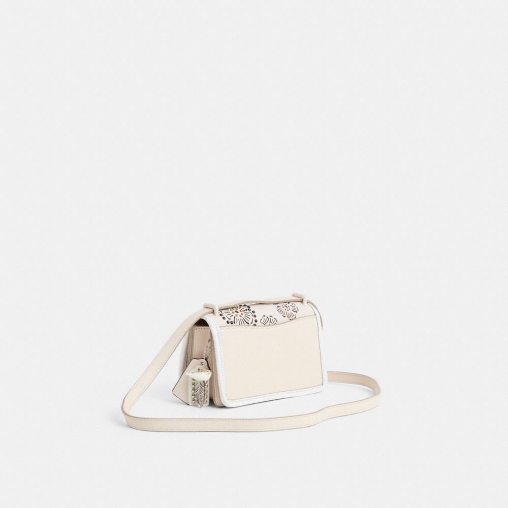 COACH®,Upcrafted Bandit Crossbody Bag,Calfskin Leather,Crossbody,Perforated,Metal,Studded,3D Embellishment,Logo,Silver Met...,Cream,Angle View