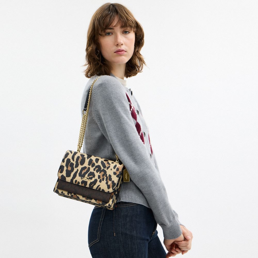 コーチ coachシグネチャー ロボット刺繍ニット マフラー　新品未使用❗️ コーチ coachシグネチャー ロボット刺繍ニット マフラー 新品未