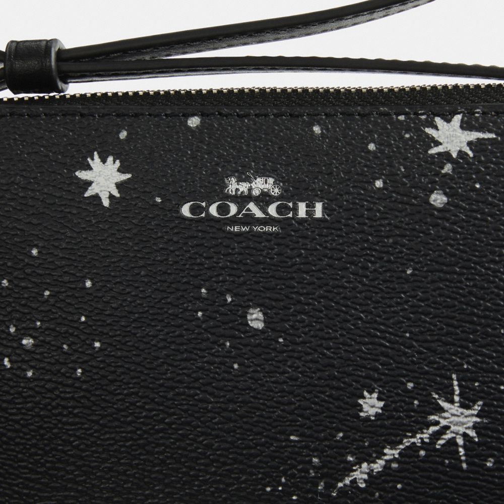 COACH®,Corner Zip Wristlet With Star Print,,Closer View