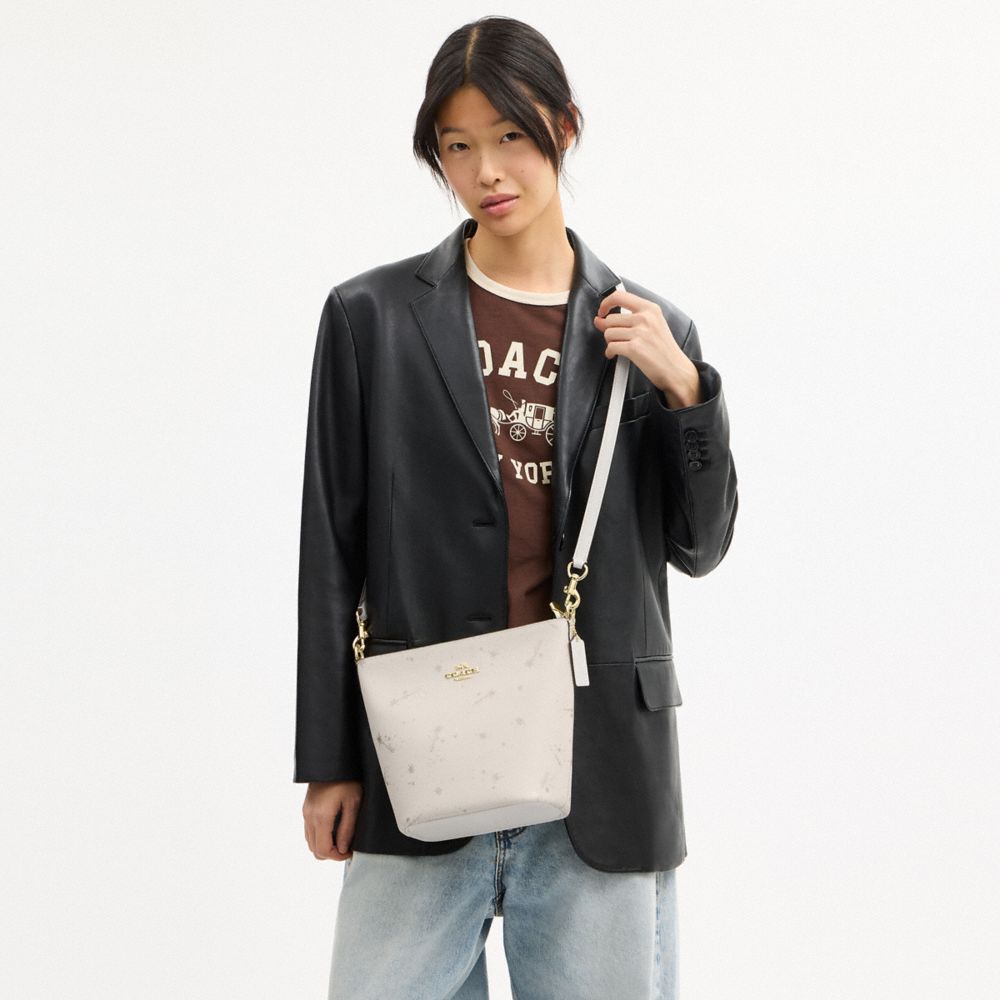 COACH®,Logan Duffle Bag With Star Print,Cream