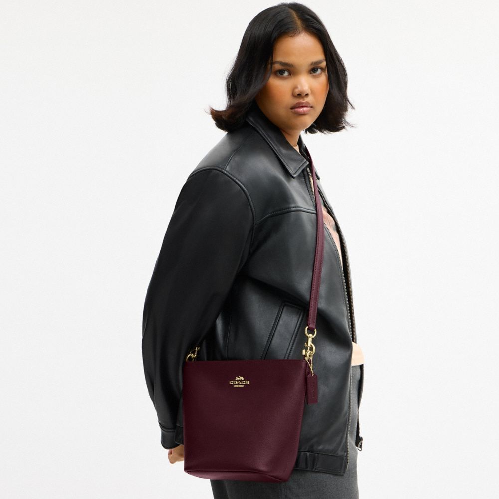 COACH®,Logan Duffle Bag,Maroon
