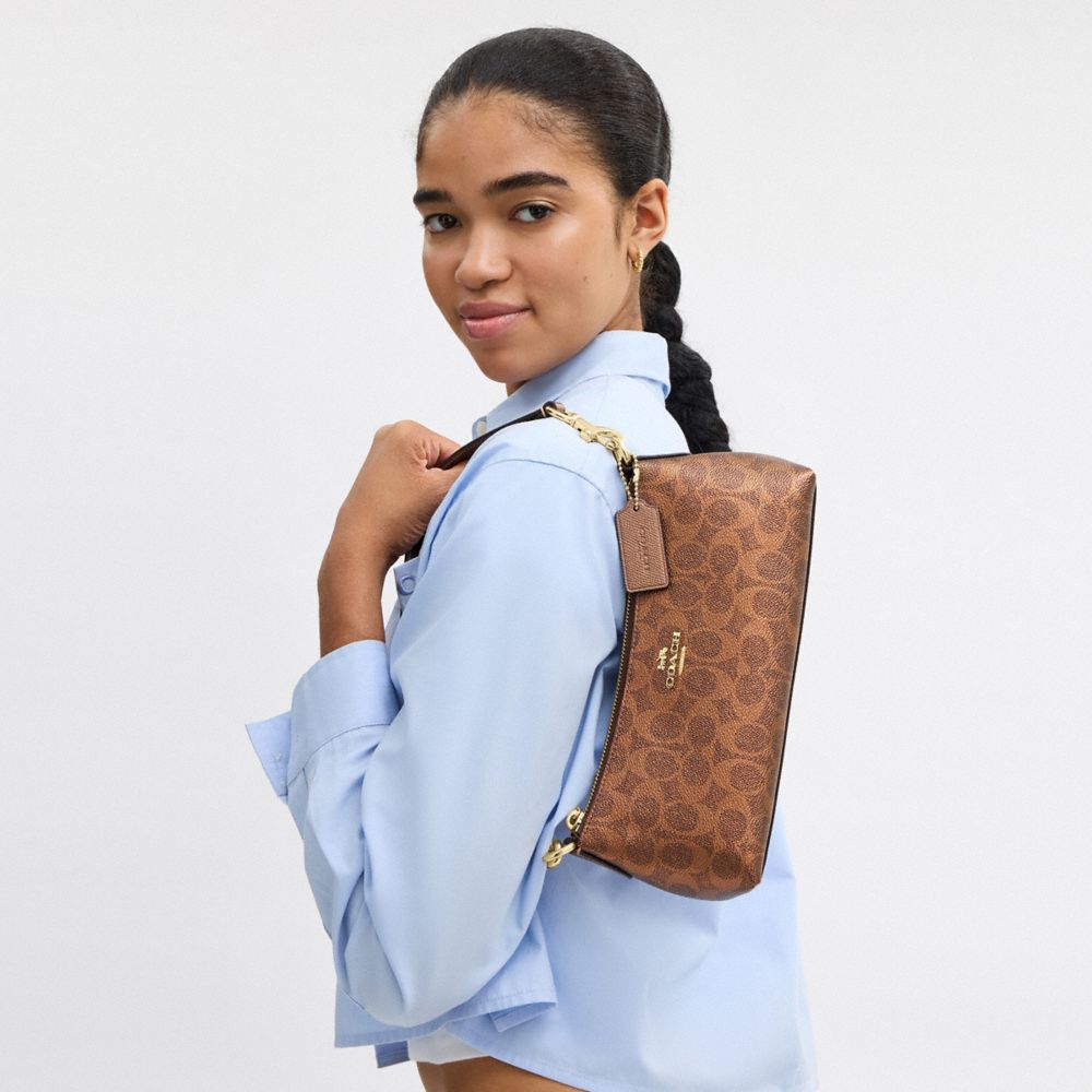 COACH®,Charlotte Shoulder Bag In Signature Canvas,Brown