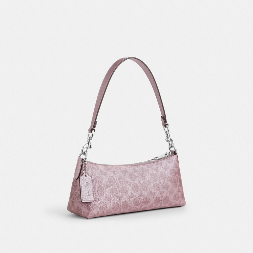 COACH®,Charlotte Shoulder Bag In Signature Canvas,Pink,Angle View