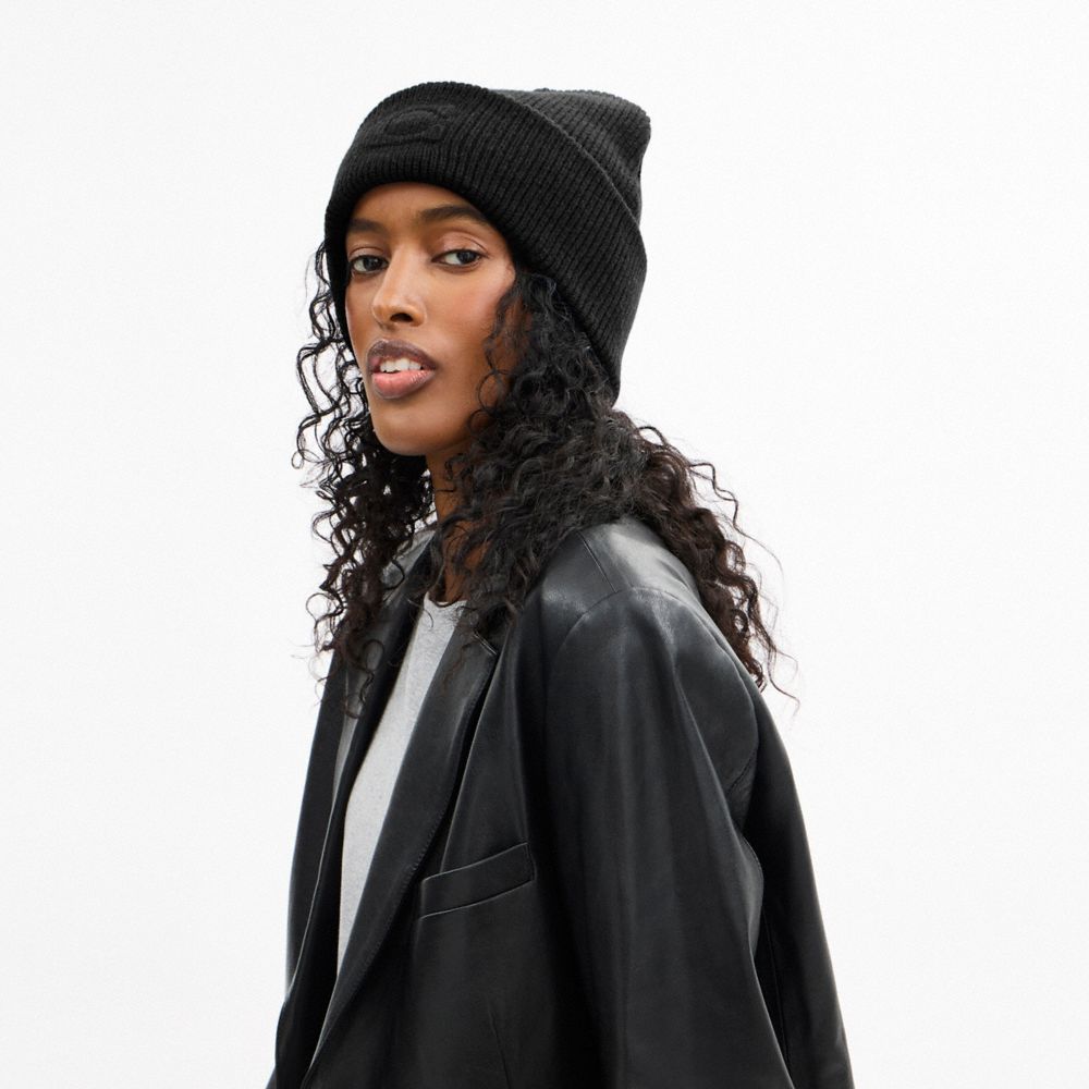 Coach Signature Embossed Knit Beanie In Black